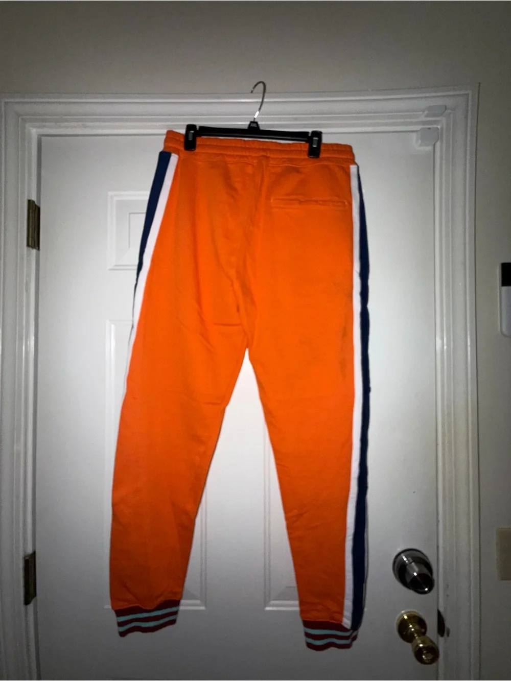 Men’s Strivers Row Stripe Jogger Pants with cuff detail. Sz L